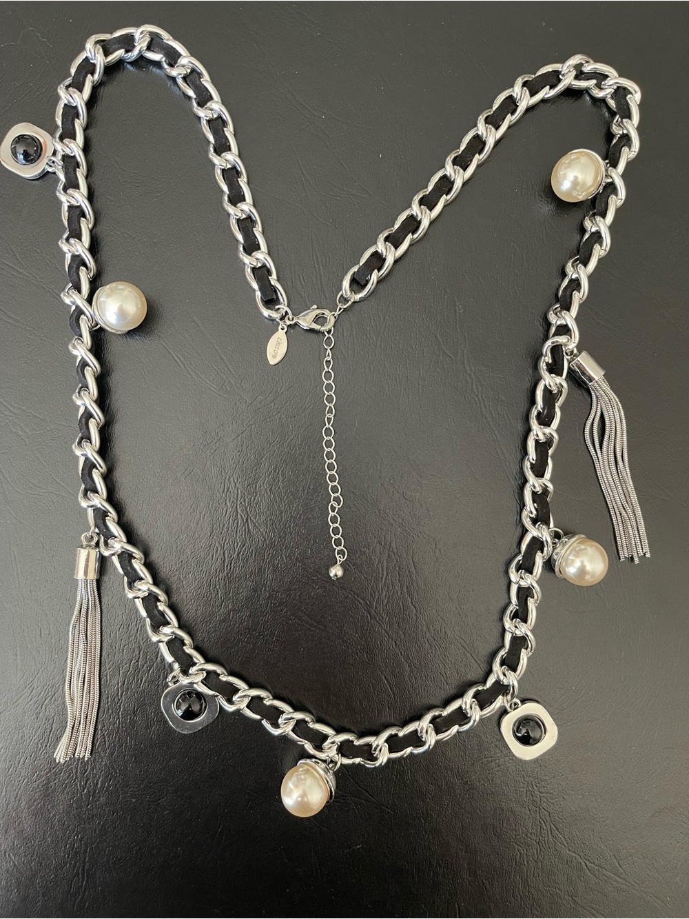 Chico’s silver tone belt with Pearl and Tassel Charms.